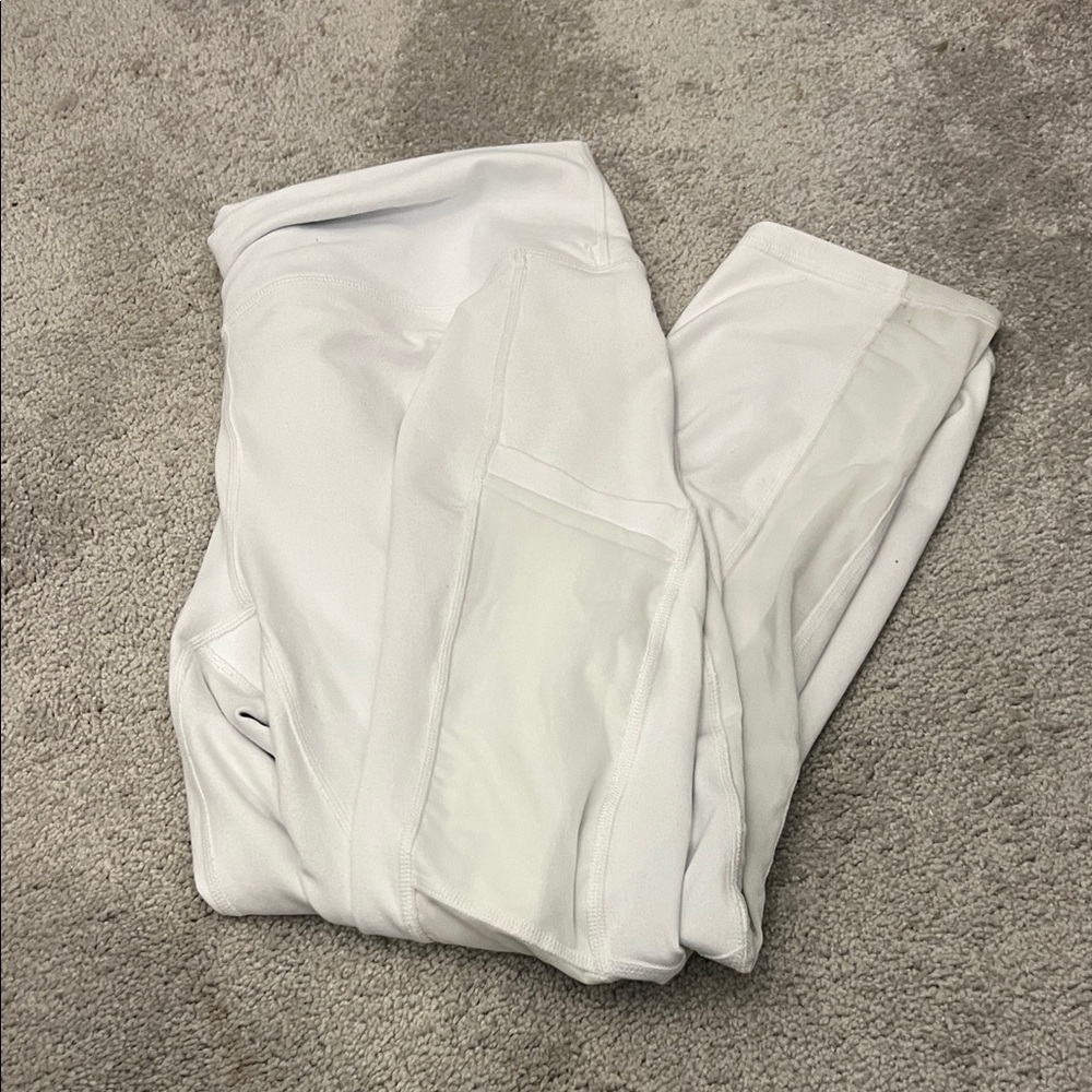 White fabletics power hold pocket Athletic Capri legging